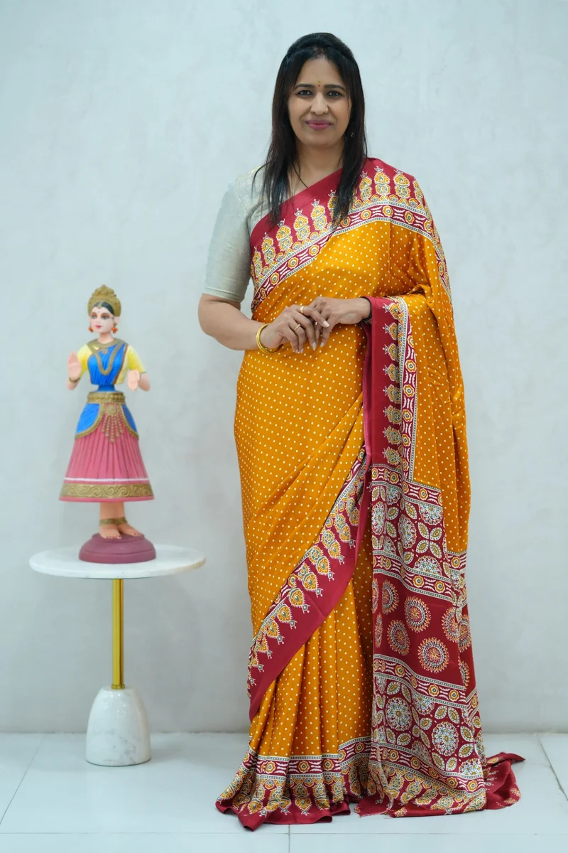 Satin Silk Saree in yellow and red colour with ajrakh printed border