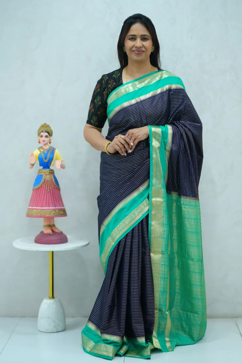 Crepe silk saree in deep blue and sea green combination