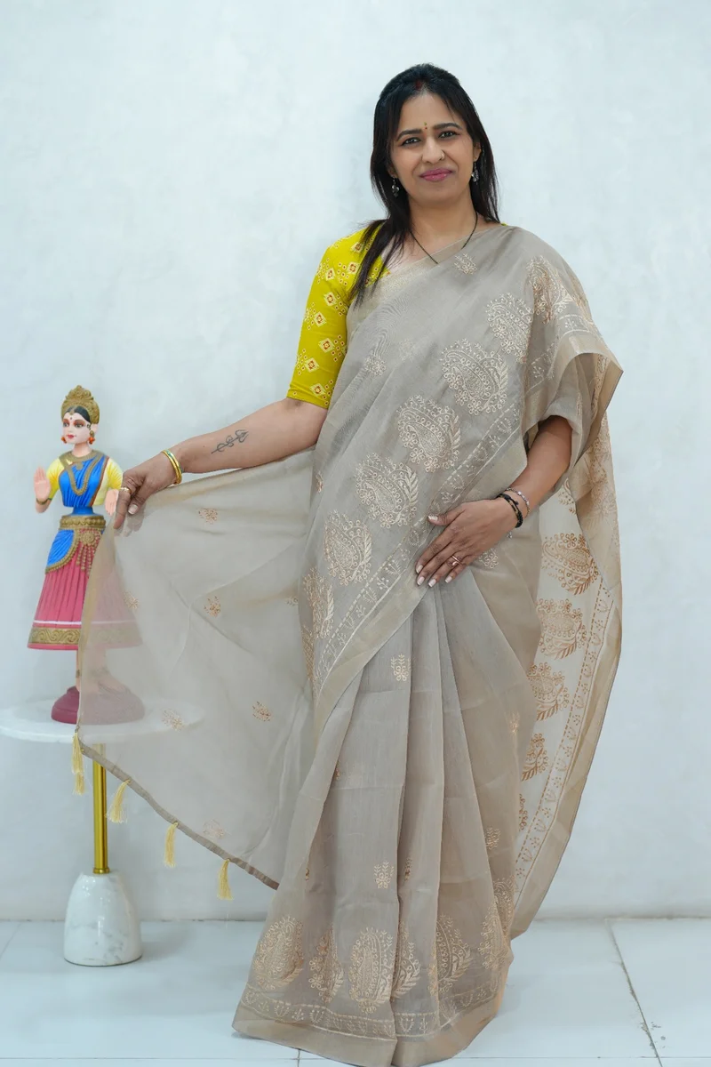 Cotton Silk saree greyish beige with thread buttas, zari border