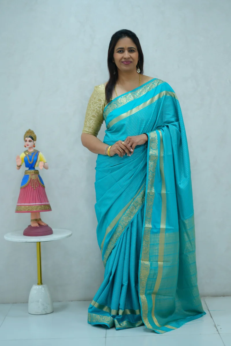 Semi mysore crepe silk saree in single tone light blue all over zari