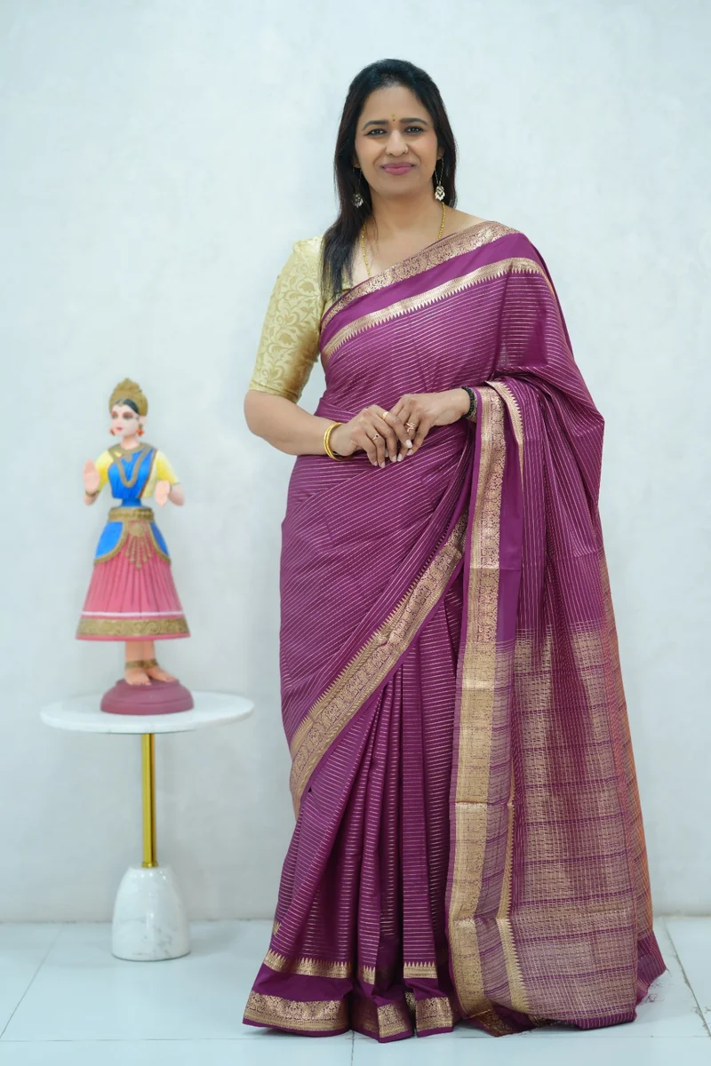 Semi mysore crepe silk saree in single tone magenta shade all over zari